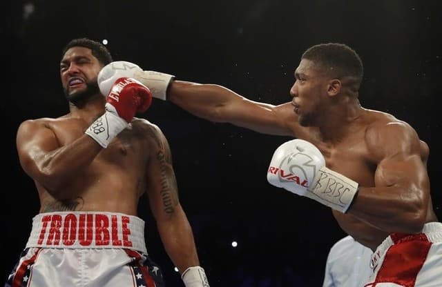 Joshua overpowers Breazeale
